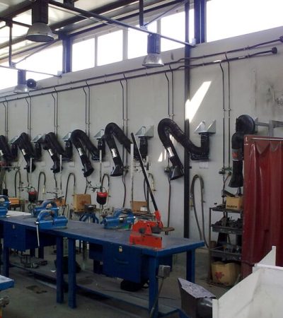 Brazos de extracción articulados